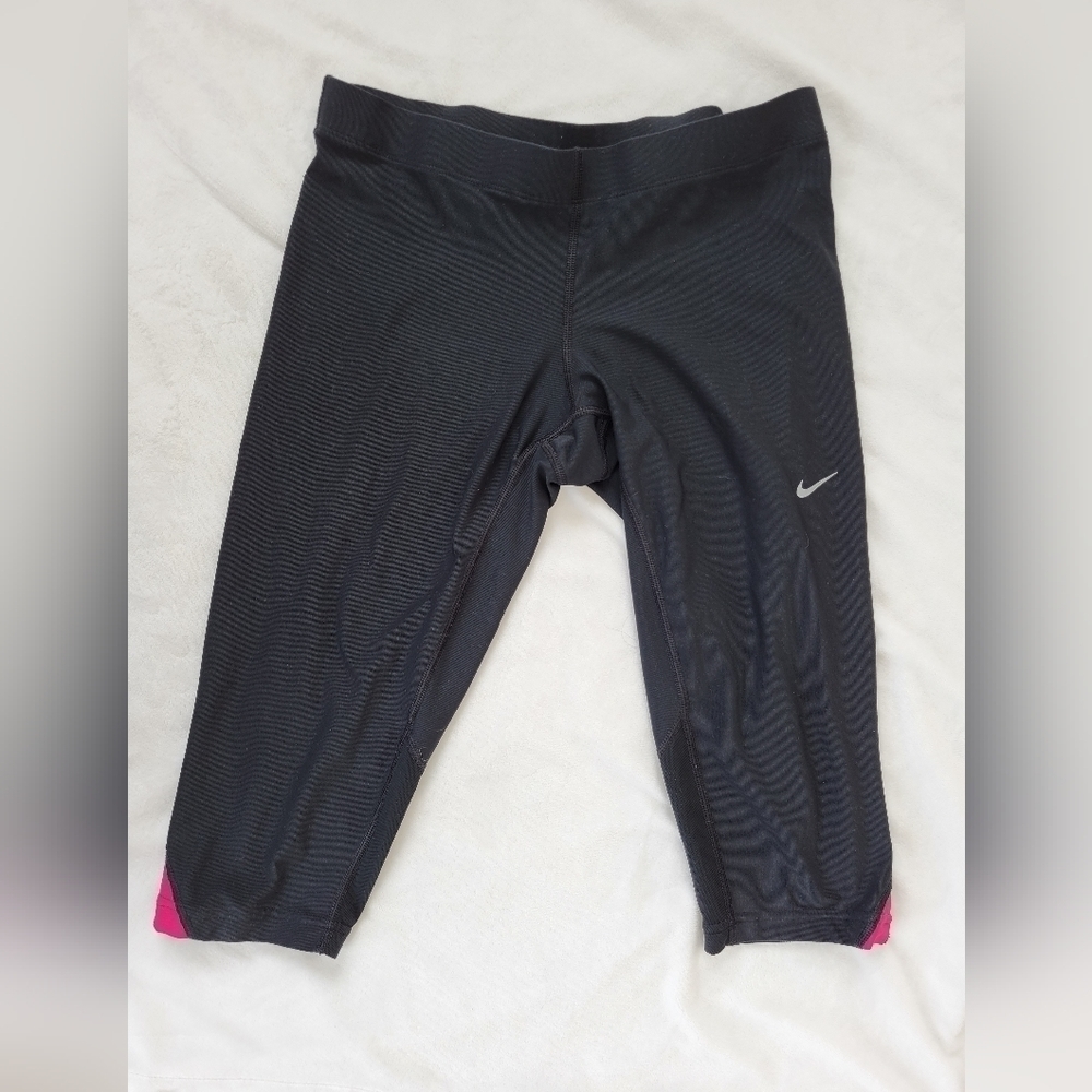 Nike Dry-fit capri black with pink and mesh detailing zip pocket on back size S.